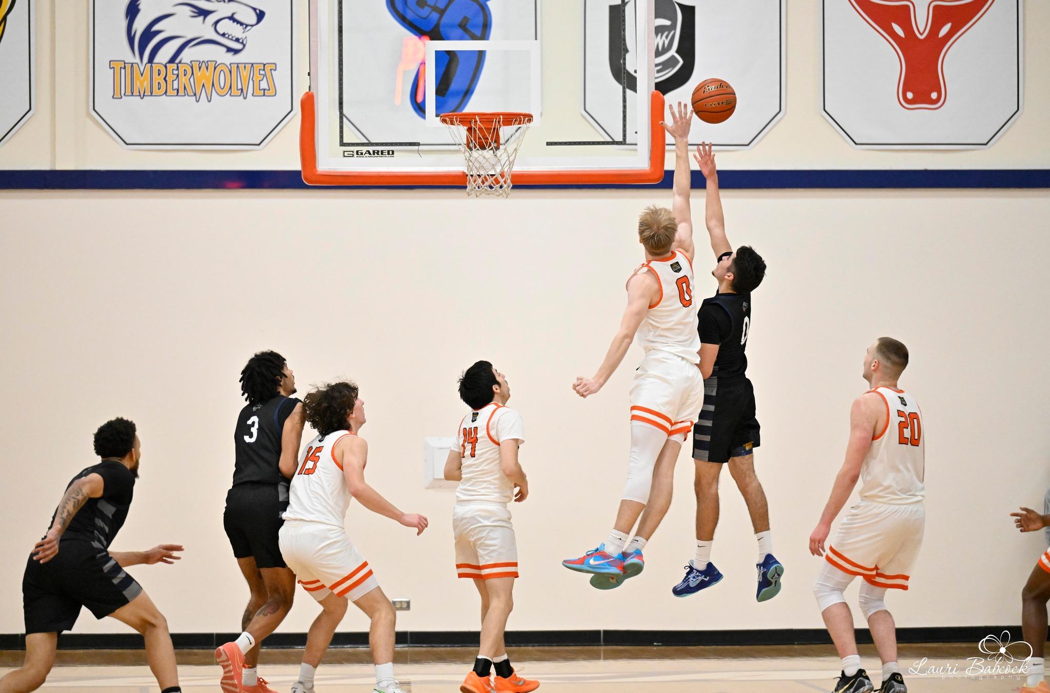Men's Basketball Undefeated in Eastern Region Competition